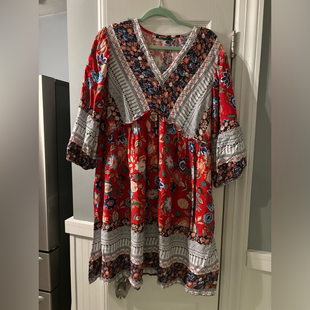 Two dresses for the price of one. Womens XL swing dresses.